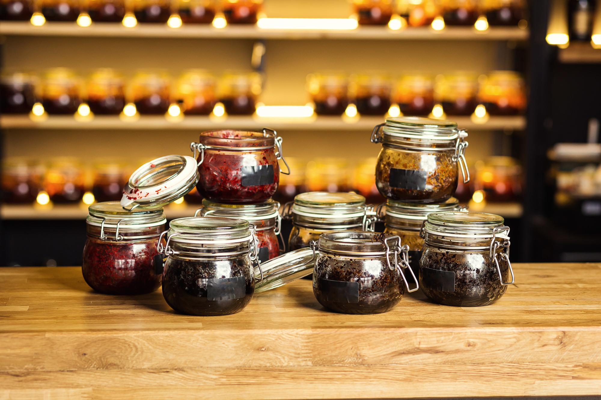Workshop bench with jars of preserved ingredients