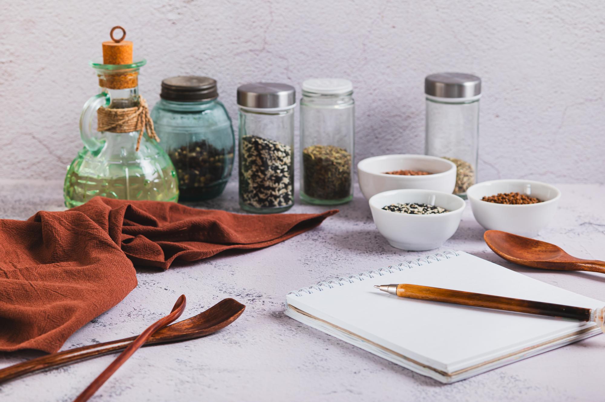 Consultation notebook and sample jars on table